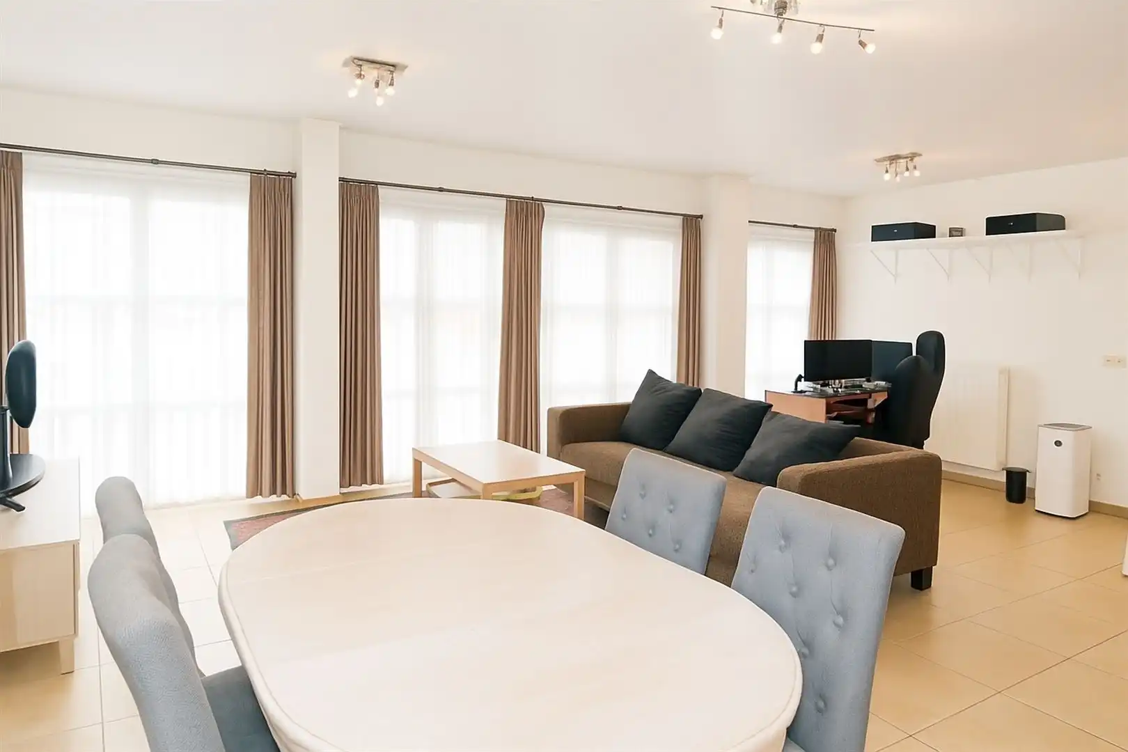 Modern gelijkvloersappartement + tuin & garage op toplocatie foto 4