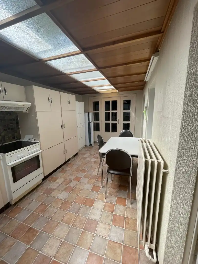 Verzorgde halfopen woning met 3 slaapkamers, garage en tuin nabij het centrum van Mol foto 14