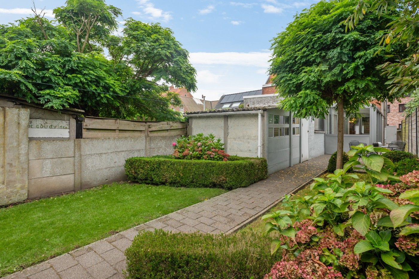 Te renoveren woning met 2 à 3 slpk., dubbele garage en tuin foto 24