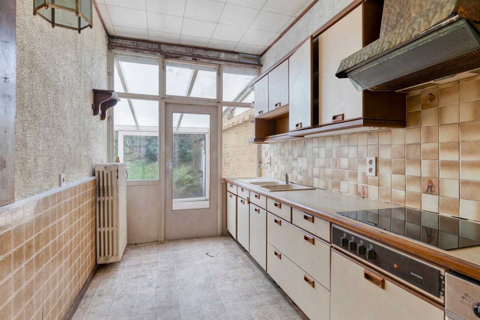 Te renoveren herenhuis met tuin nabij Sint-Guidoplein foto 8