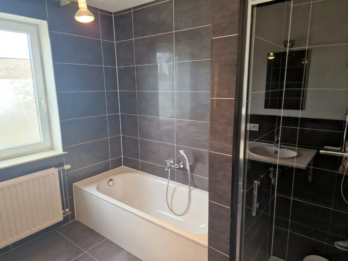 Recente halfopen woning met zonnige tuin  foto 15