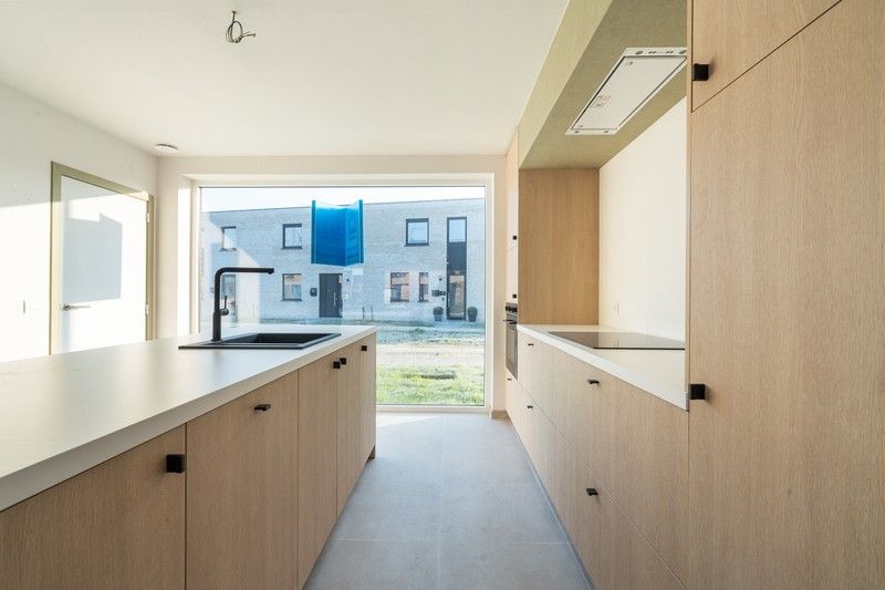 Instapklare nieuwbouwwoning met zonnige tuin te Roeselare foto 7