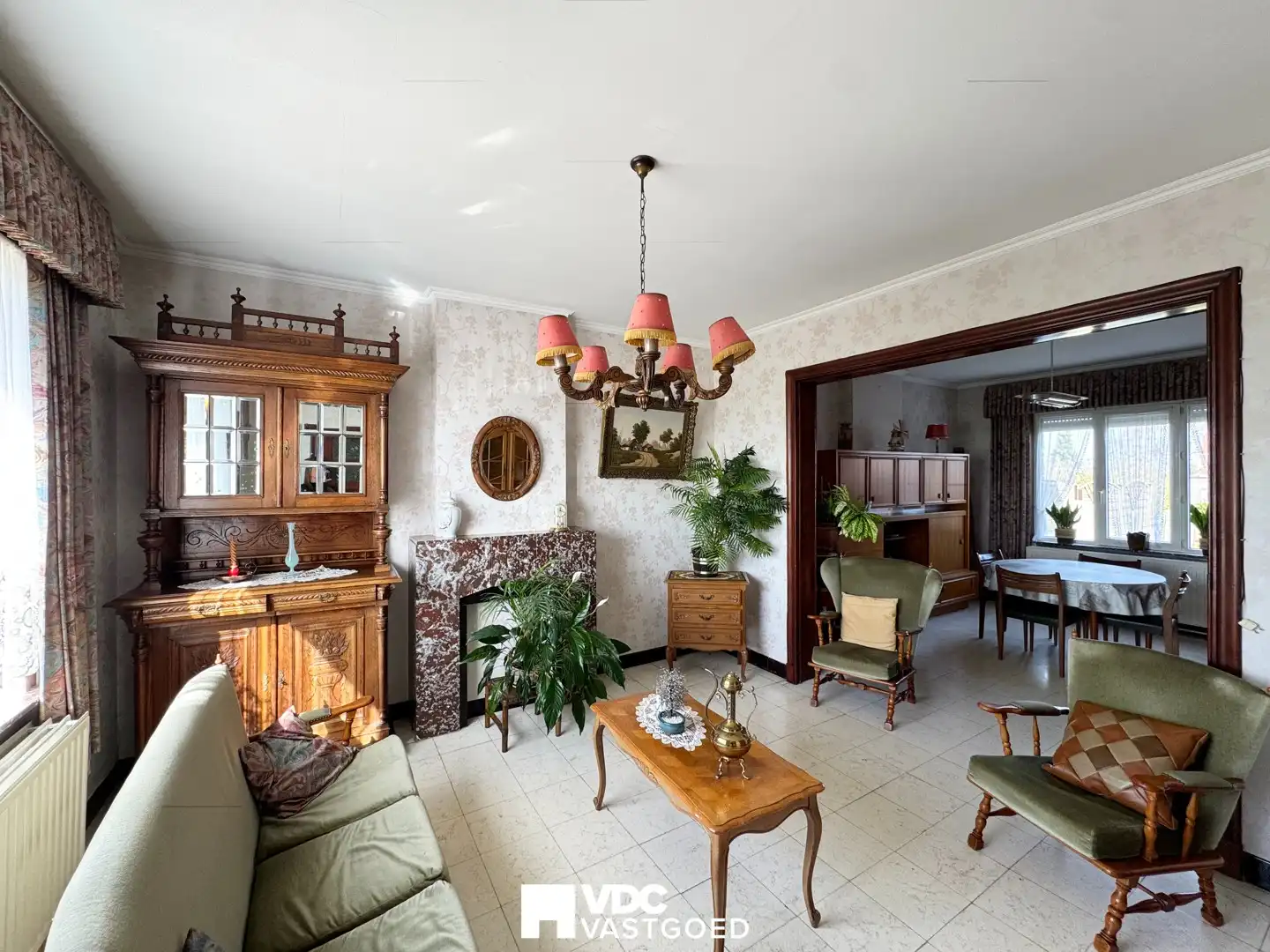 Charmante te renoveren woning met tuin, garage en sterk investeringspotentieel foto 3