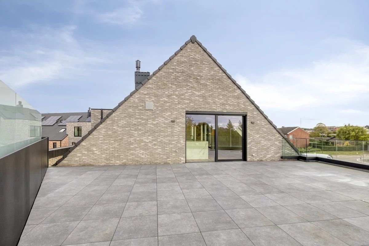 EXCLUSIEF EN KWALITATIEF NIEUWBOUWAPPARTEMENT VAN 163 M² MET 3 SLPK'S, 2 BADK'S EN RIANTE TERRASSEN IN MUNSTERBILZEN foto 3