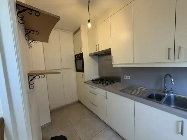 Gelijkvloersappartement met 2 slaapkamers + kelder foto 5