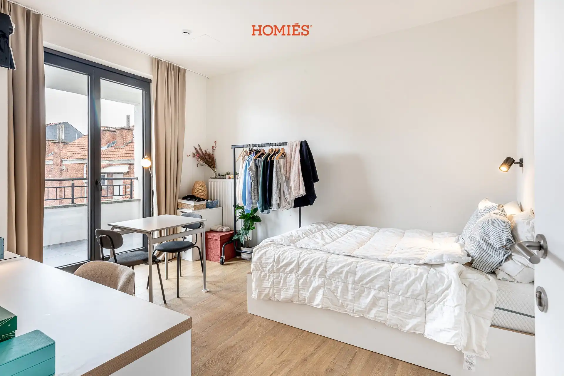 Studentenkamer met terras en eigen sanitair foto {{pictureIndex}}