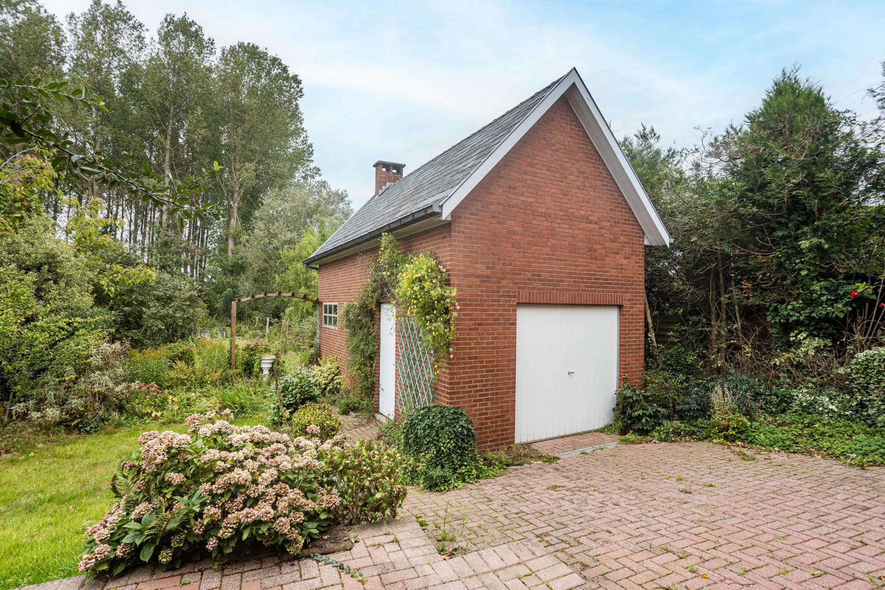 Ruime gezinswoning met 5 SLPK en bureau foto 28