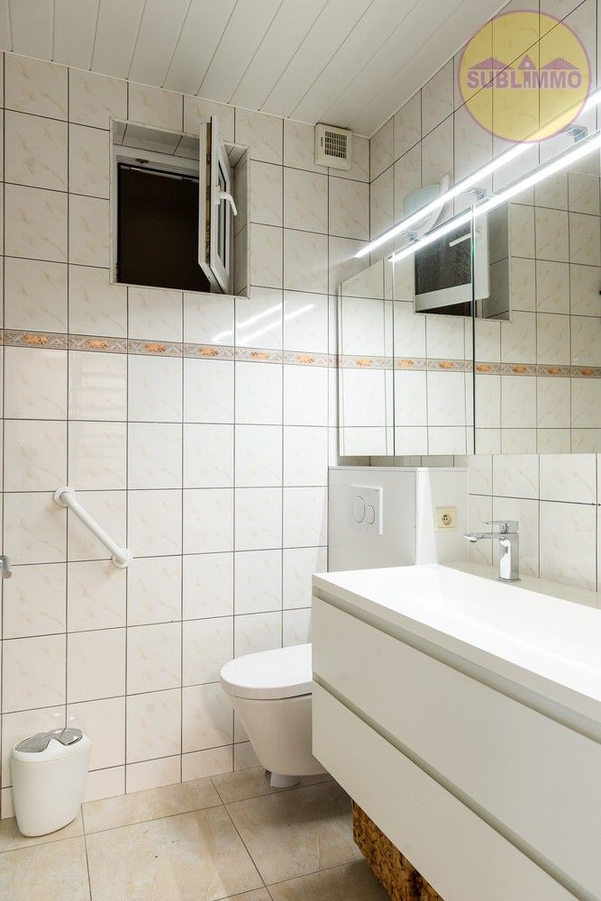 Ruime woning met afzonderlijk appartement op een perceel van 858 m² in Mol. foto 9