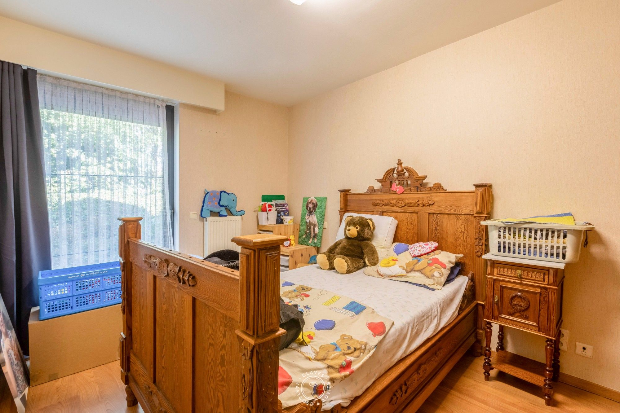 Ruim gelijkvloers appartement met tuin foto 12