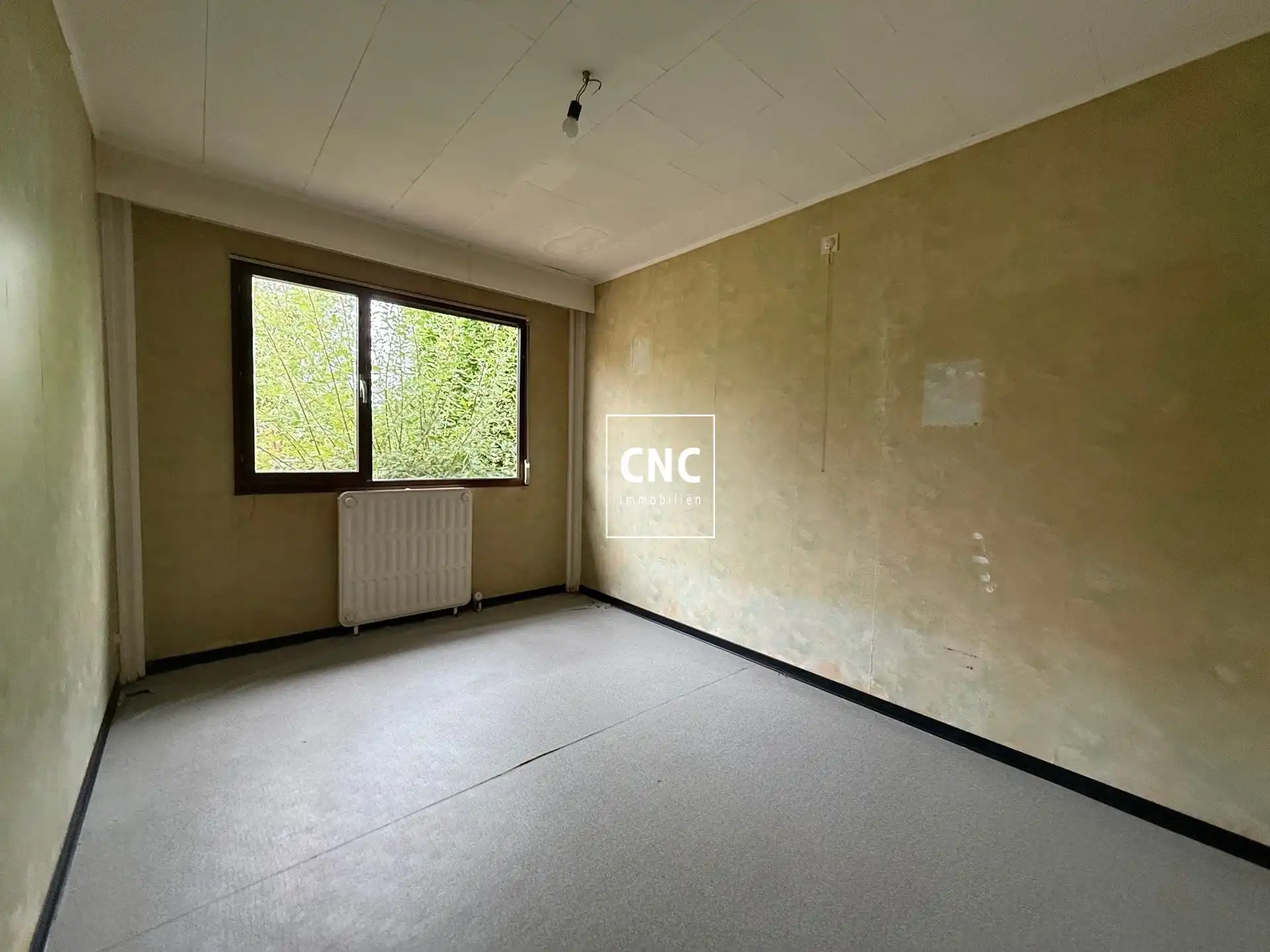 Halfopen bebouwing met 3 slaapkamers en grote tuin foto 8
