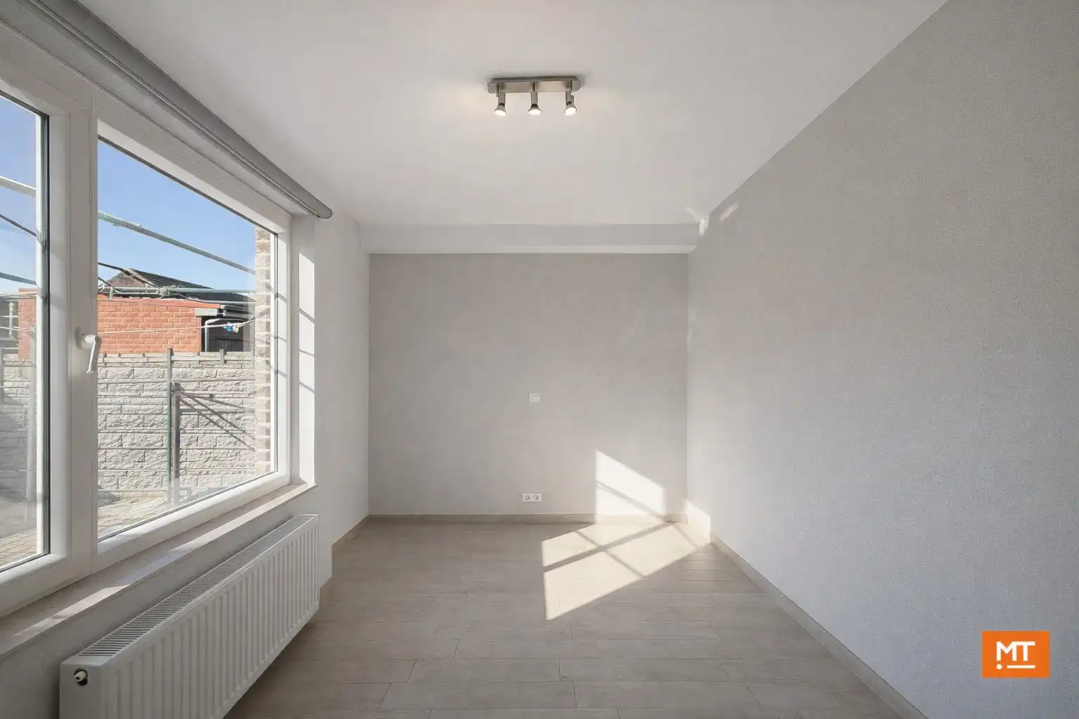 Gelijkvloers appartement met 2 slaapkamers, Zuidwestgericht terras en garage in het centrum van Zonnebeke foto 6