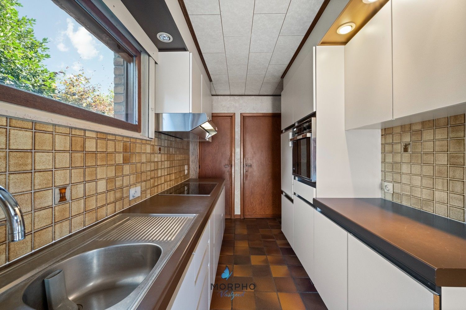 Te koop in Veldegem – Karaktervolle woning met veel potentieel op ruim perceel van 1.602 m² foto 8