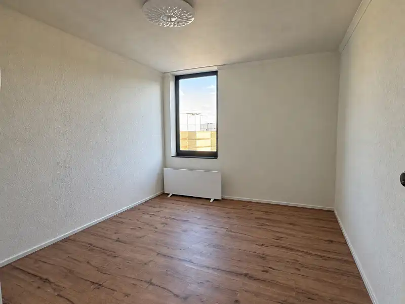 Gerenoveerd appartement met 3 slaapkamers en zonnig terras in hartje Genk foto 14