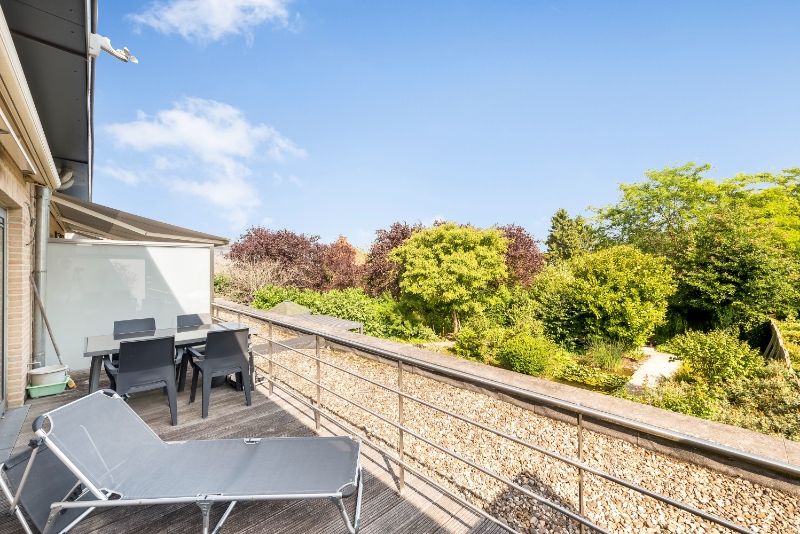 Ruim 3 slaapkamer duplex-appartement van 130m² met terras op zuid-oosten, ondergrondse staanplaats en kelder foto 9