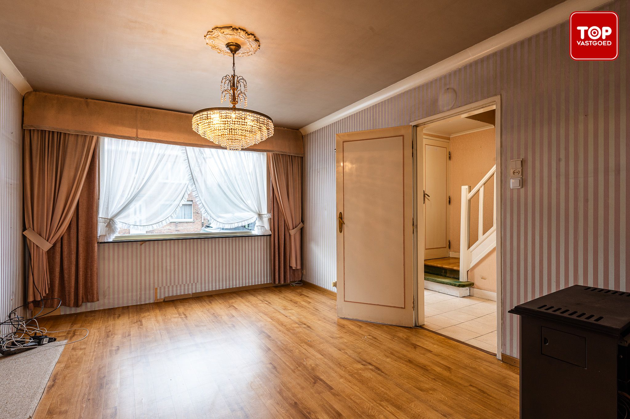 te renoveren woning met 3 slaapkamers en leuke tuin foto 3