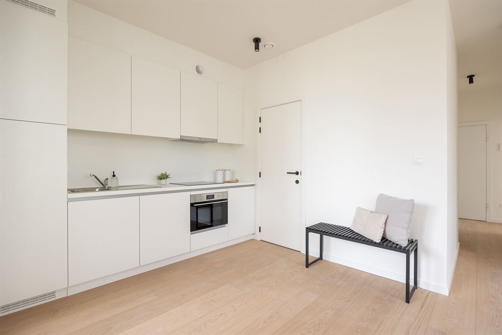 lichtrijk nieuwbouwappartement met terras foto 7