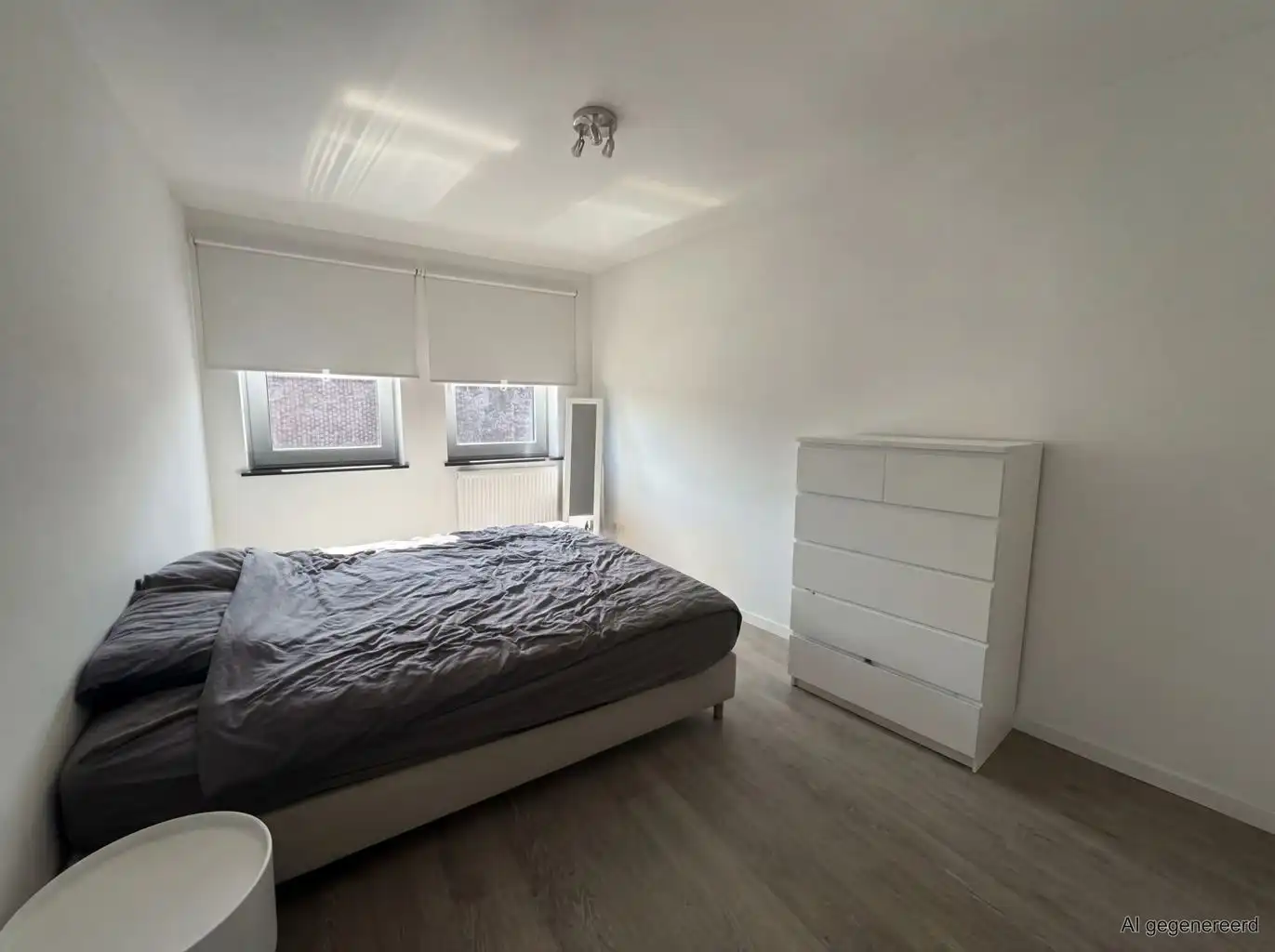 Ruim 1-slaapkamerappartement met 2 terrassen en autostaanplaats op een toplocatie in het centrum van Bree.  foto 8