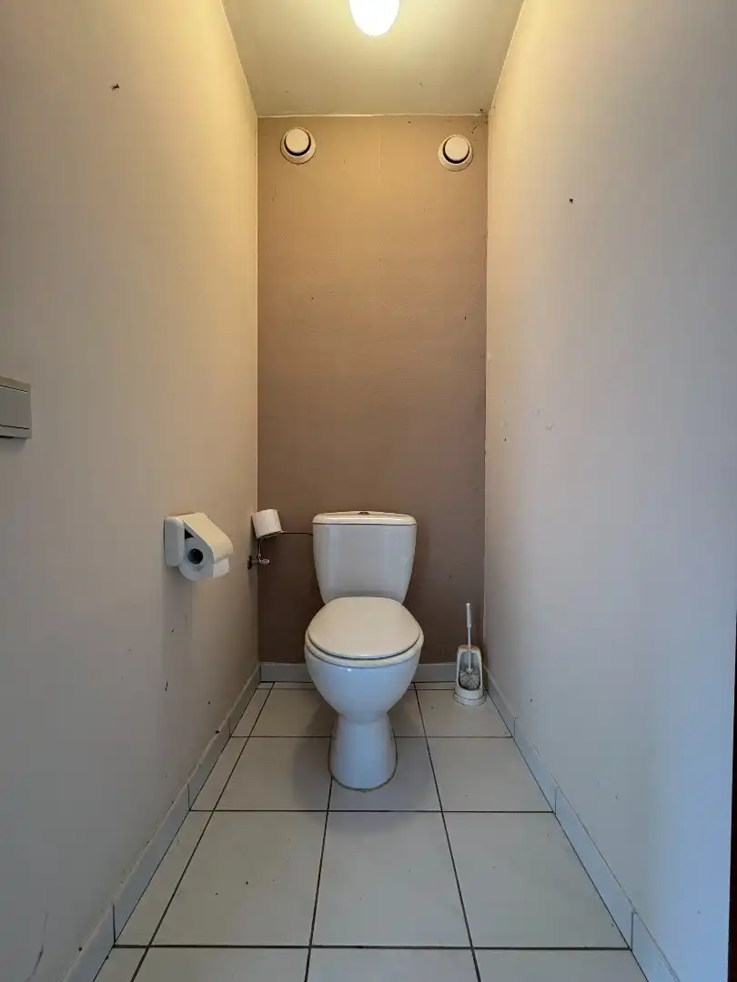 Een ruime 3-gevelwoning met tuin en garage foto 15