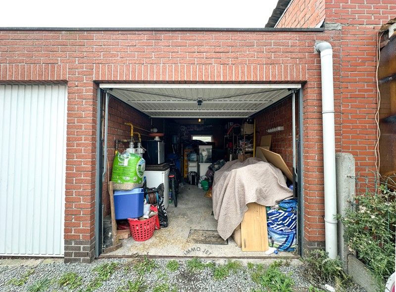 Appartementsgebouw met twee wooneenheden, garages en tuin foto 27