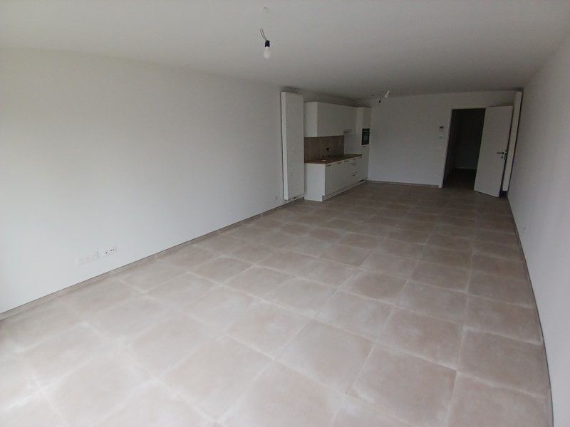 Gelijkvloers nieuwbouw appartement met terras en tuin gelegen in het centrum van Opglabbeek foto 7