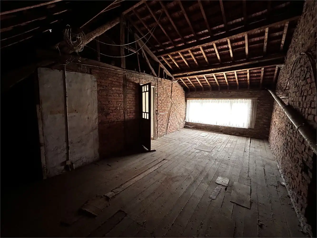 Te renoveren handelshuis met woonst foto 35