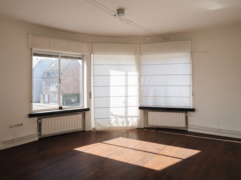 Voormalige dokterswoning met praktijkruimte en stadstuin foto 14