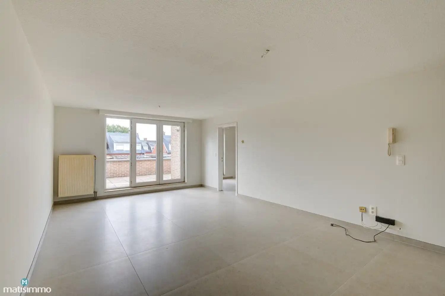 INSTAPKLAAR APPARTEMENT MET 2 SLAAPKAMERS EN GARAGE NABIJ HET CENTRUM VAN BILZEN foto 2