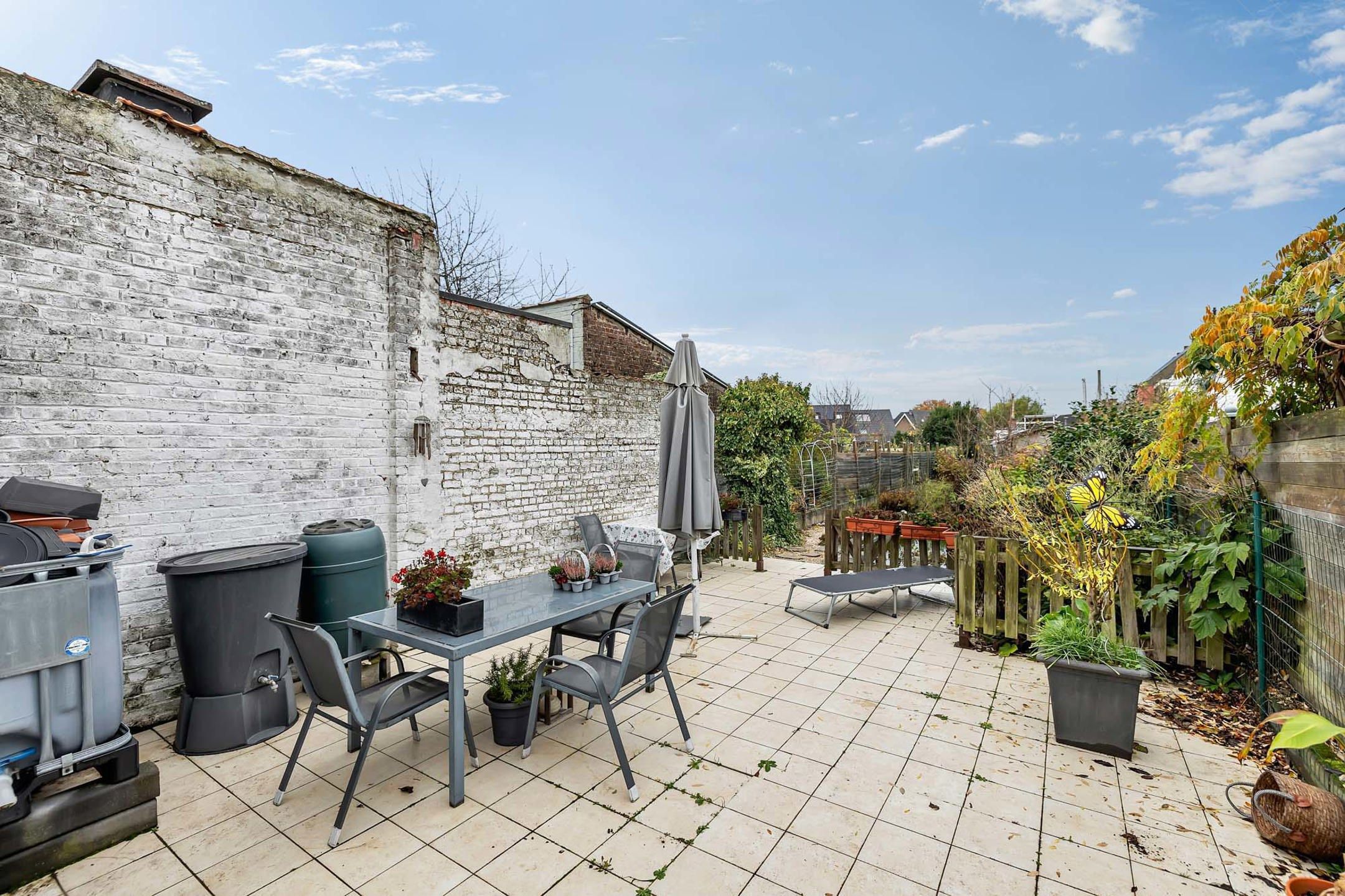 Ruime instapklare woning met 3 slpks en tuin foto 25