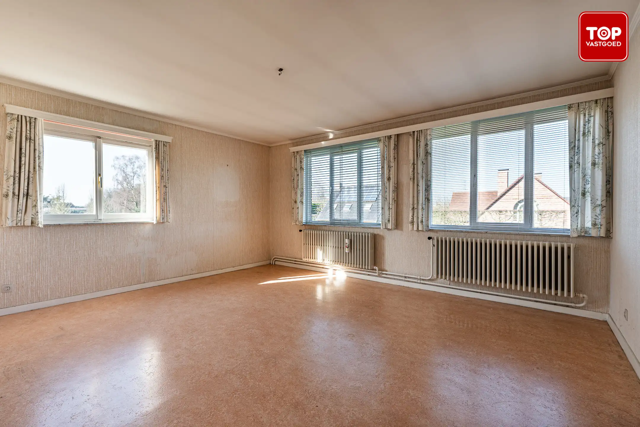 Ruime woning met uitzonderlijk potentieel op rustig gelegen perceel foto 12