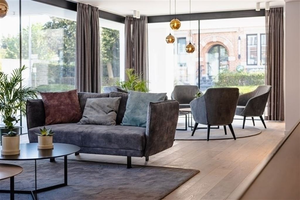 Gelijkvloerse assistentiewoning in centrum Werchter! foto 17