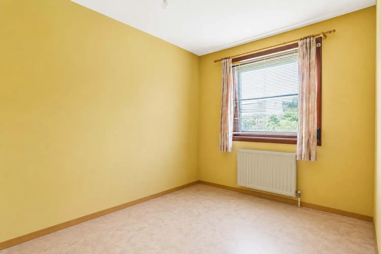 Vrijstaande laagbouwwoning met zonnige tuin en uitbreidingsmogelijkheden in Oelegem! foto 11