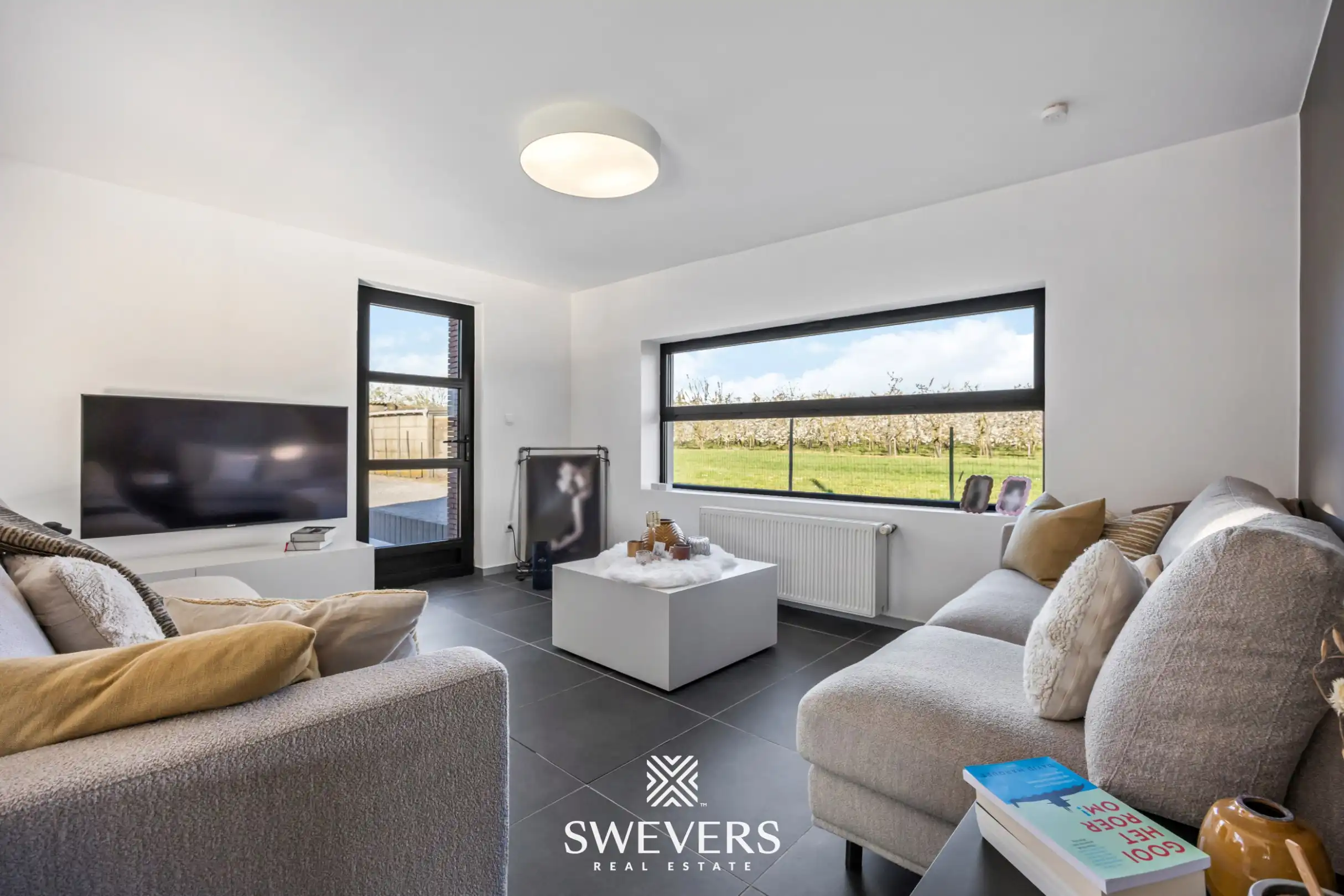 Instapklare open bebouwing met ruime tuin en prachtig uitzicht tussen de boomgaarden in Gingelom foto 7