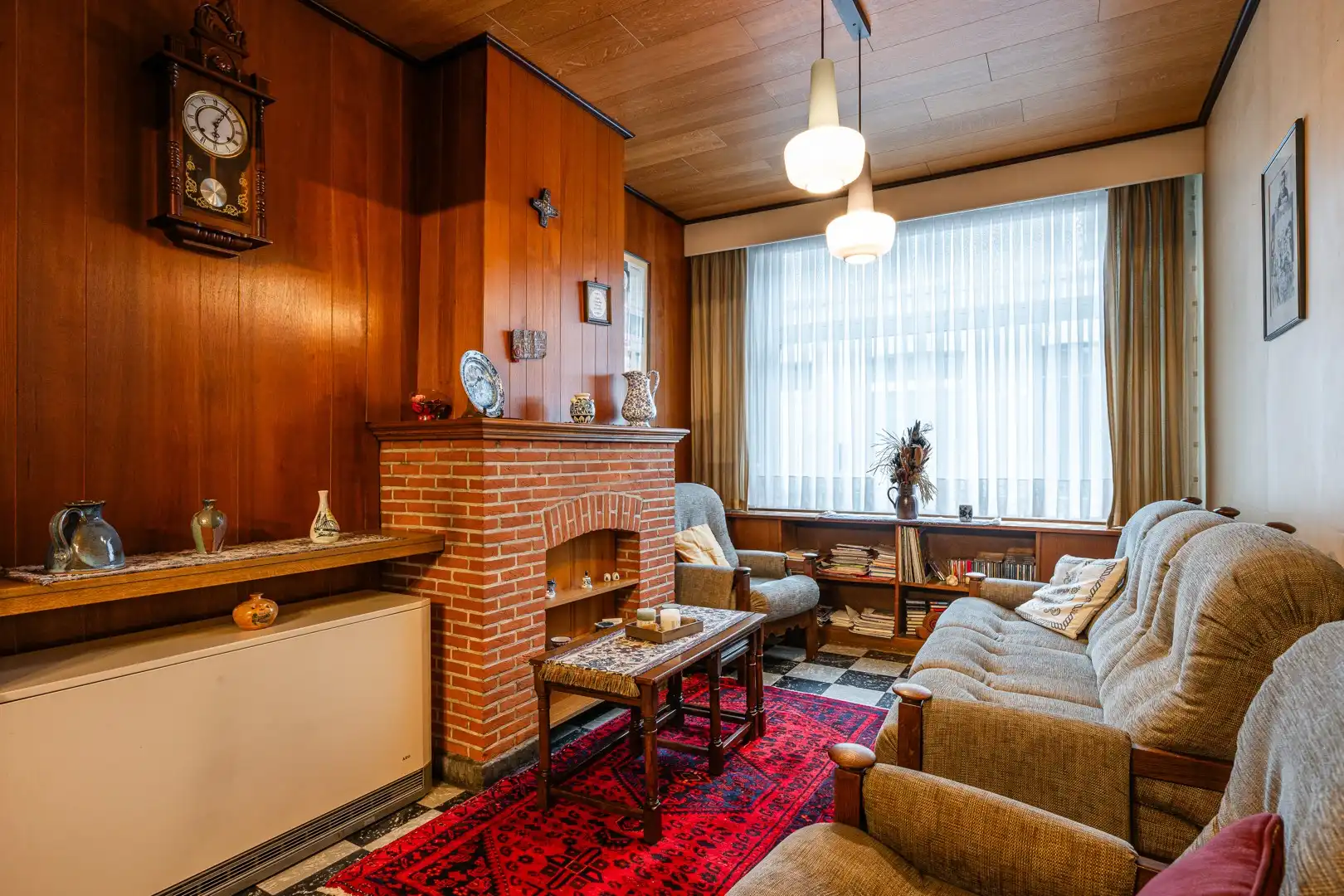 Te renoveren woning met verrassend veel ruimte, stadstuin en garagebox in Eeklo! foto 3