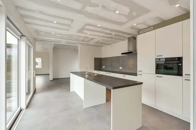 Totaal gerenoveerde woning op een perceel van 11are foto 10