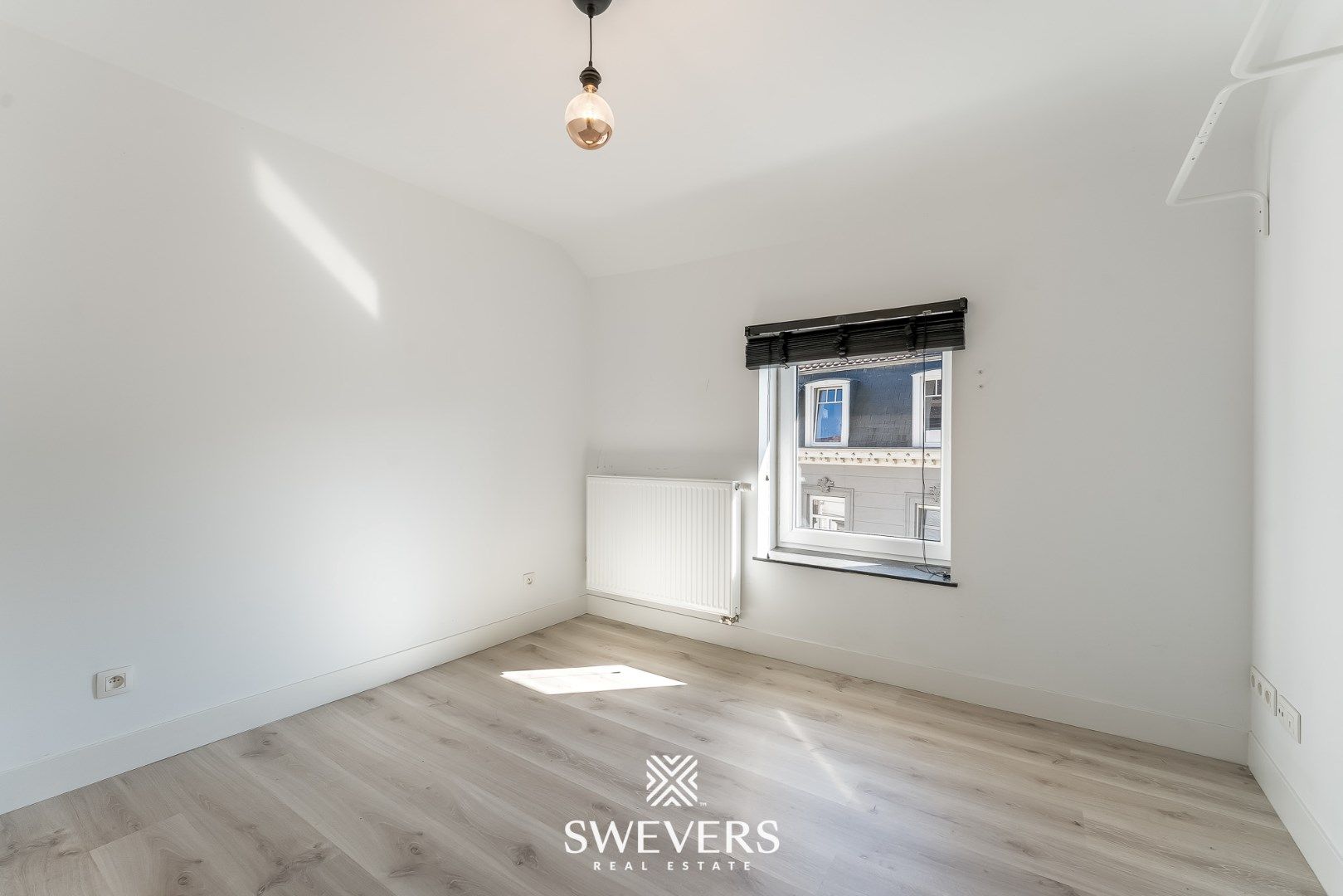 Ruim duplex appartement met knusse stadstuin in hartje Borgloon foto 21