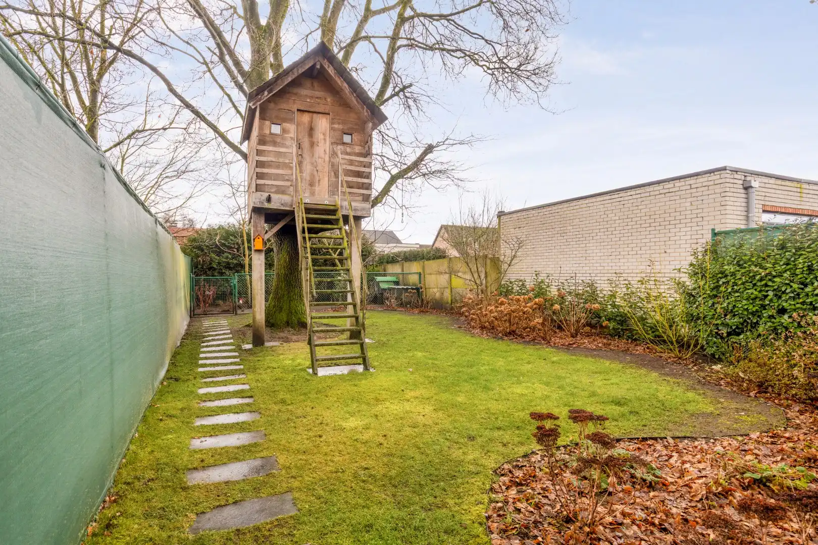 Instapklare bel-etagewoning met dubbele garage en tuin in het centrum van Retie foto 41