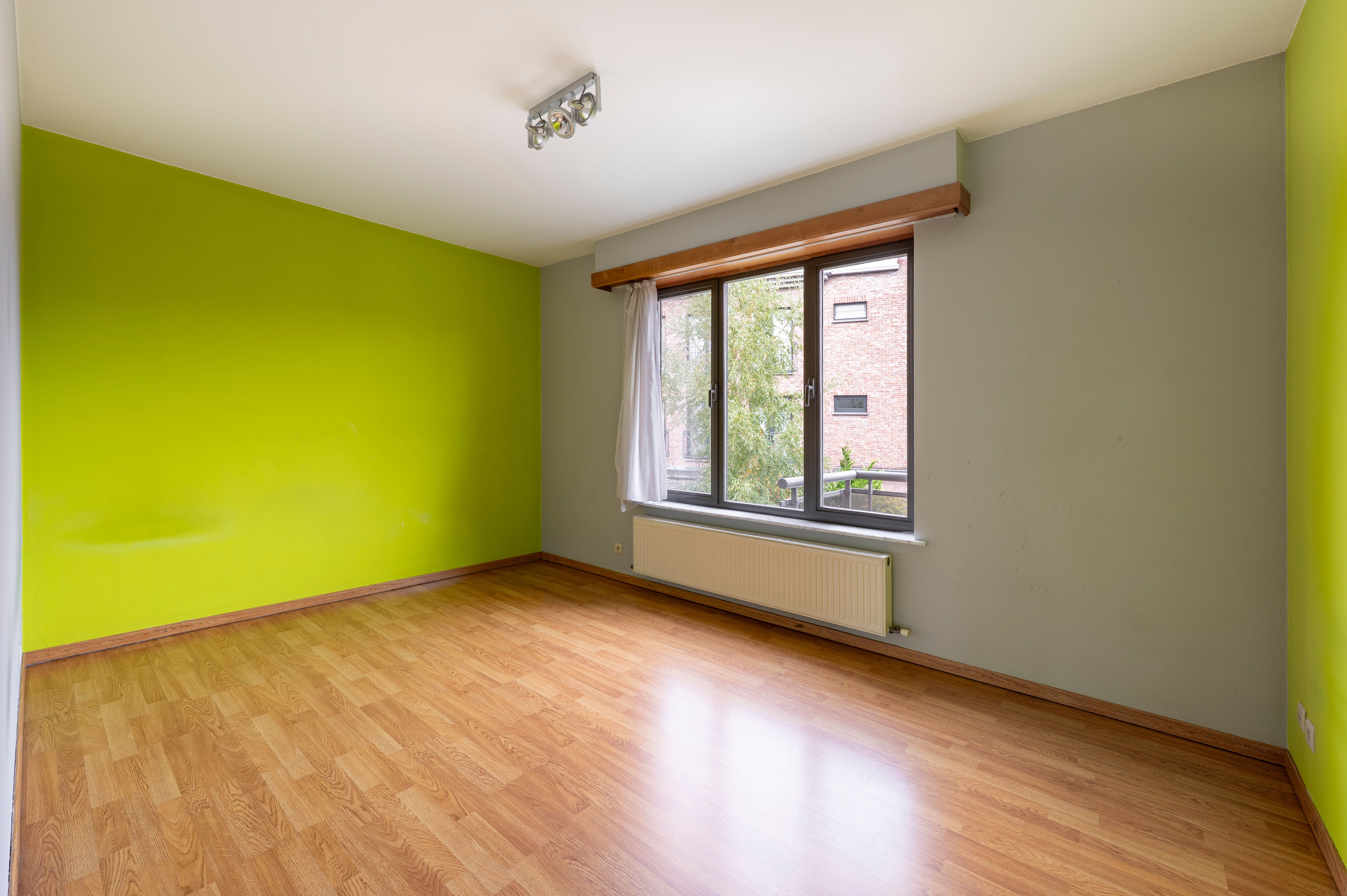 Ruim appartement met 2 slaapkamers, terras én garage in hartje Wommelgem! foto 15