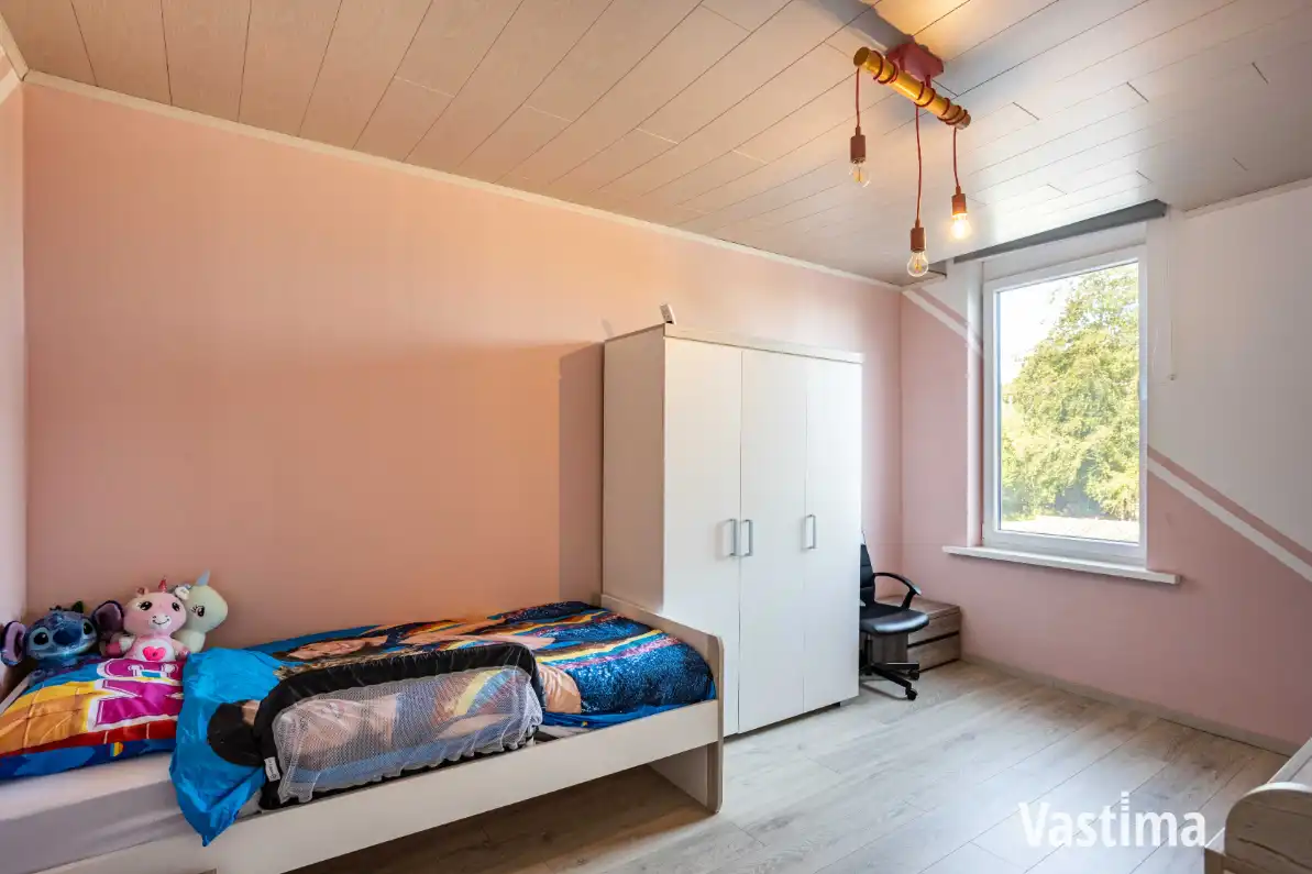 Instapklare gezinswoning met prachtige tuin en uitbreidingsmogelijkheden foto 14
