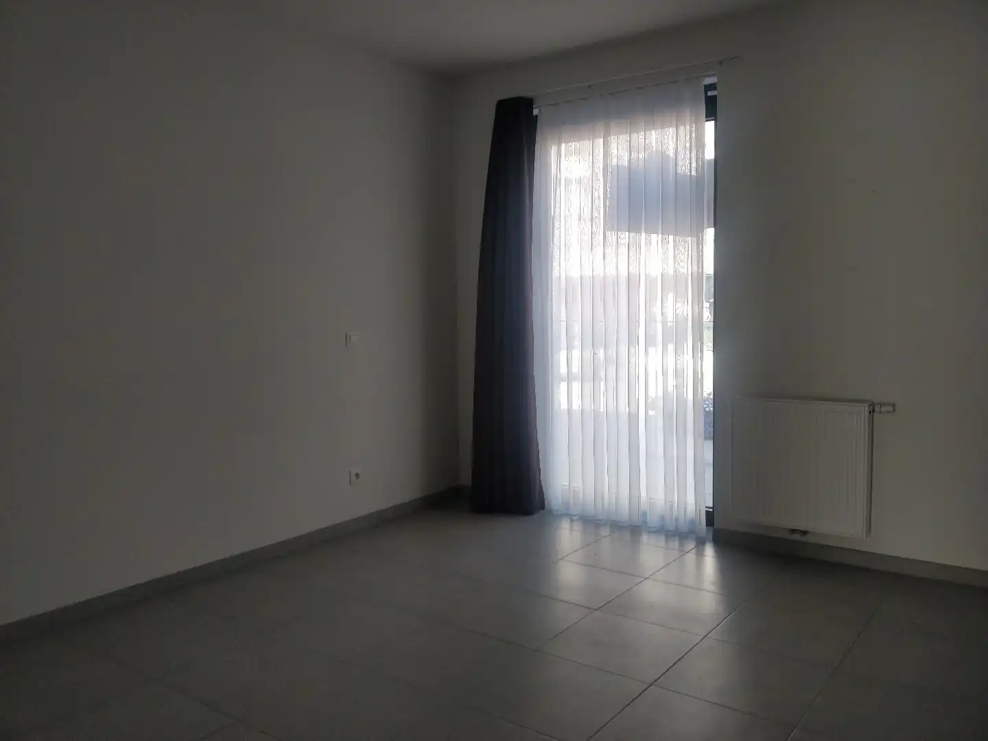 Gelijkvloers energiezuinig nieuwbouwappartement met twee slaapkamers in Lokeren foto 4