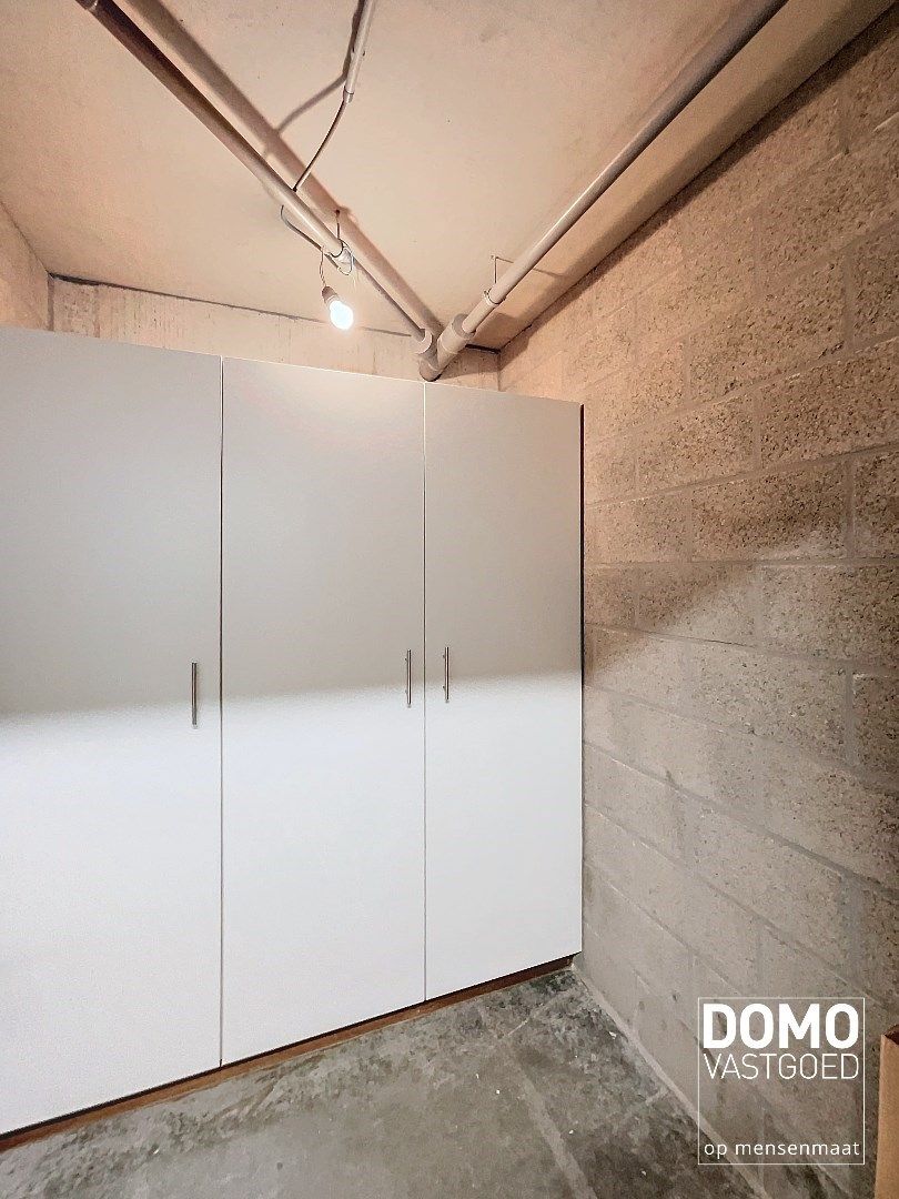 Duplex appartement met een gezellig tuintje, ondergrondse autostandplaats en 2 slaapkamers te Spalbeek - energielabel B, 109m² bewoonbare oppervlakte foto 12