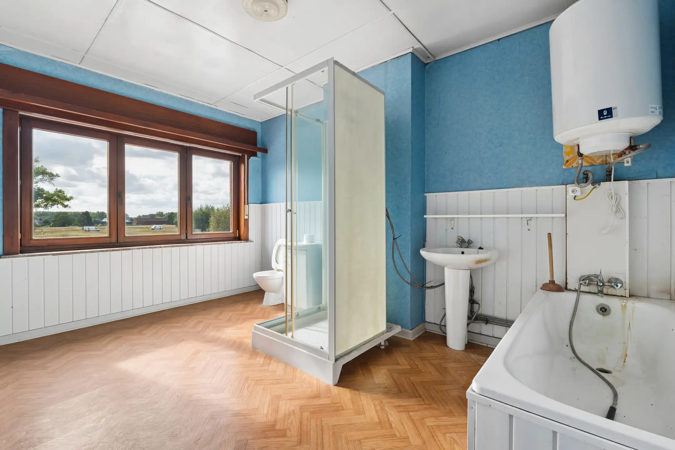 Te renoveren woning met tuin op centrale ligging foto 18
