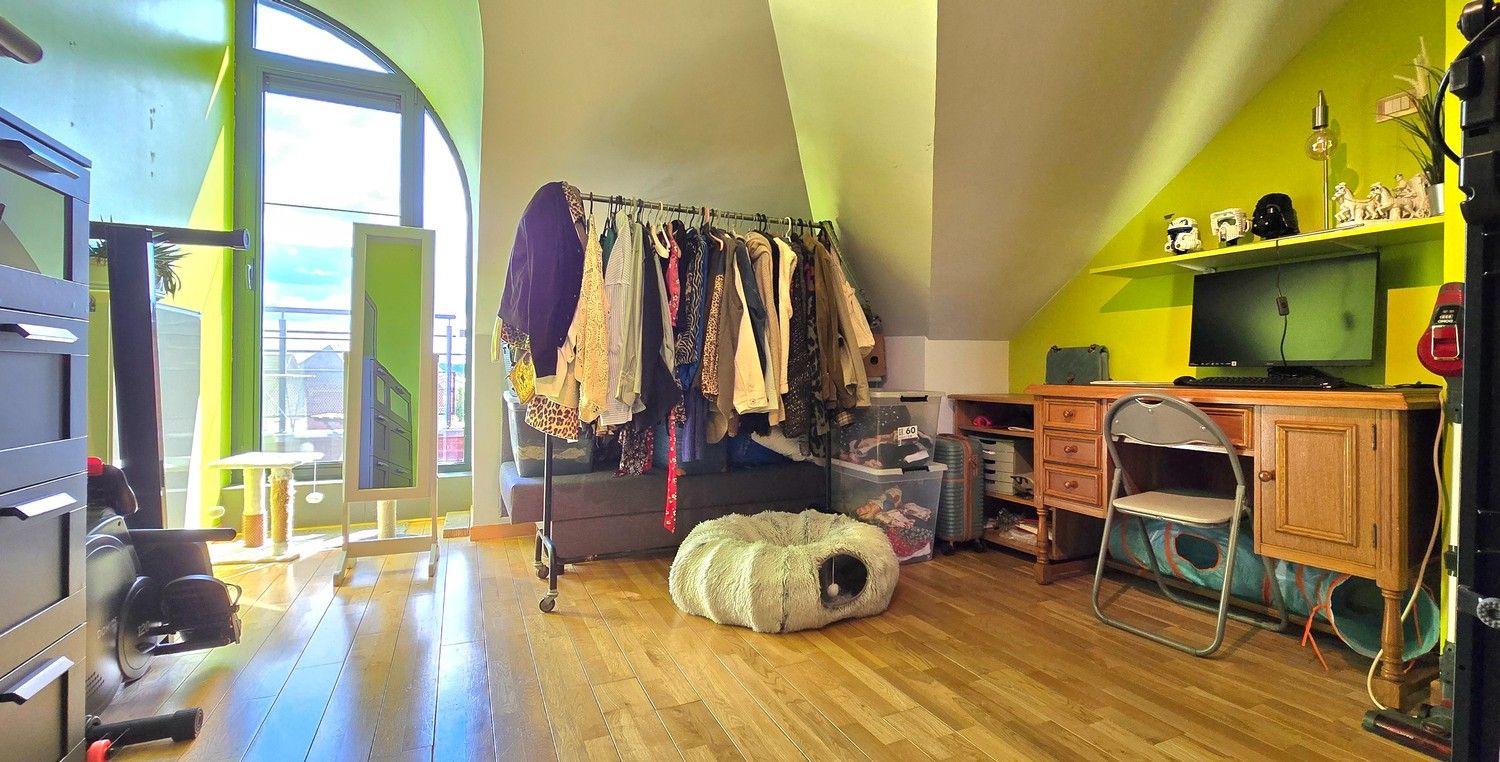 TE KOOP: Instapklaar appartement met 3 slaapkamers, dubbele garage en 2 terrassen foto 14