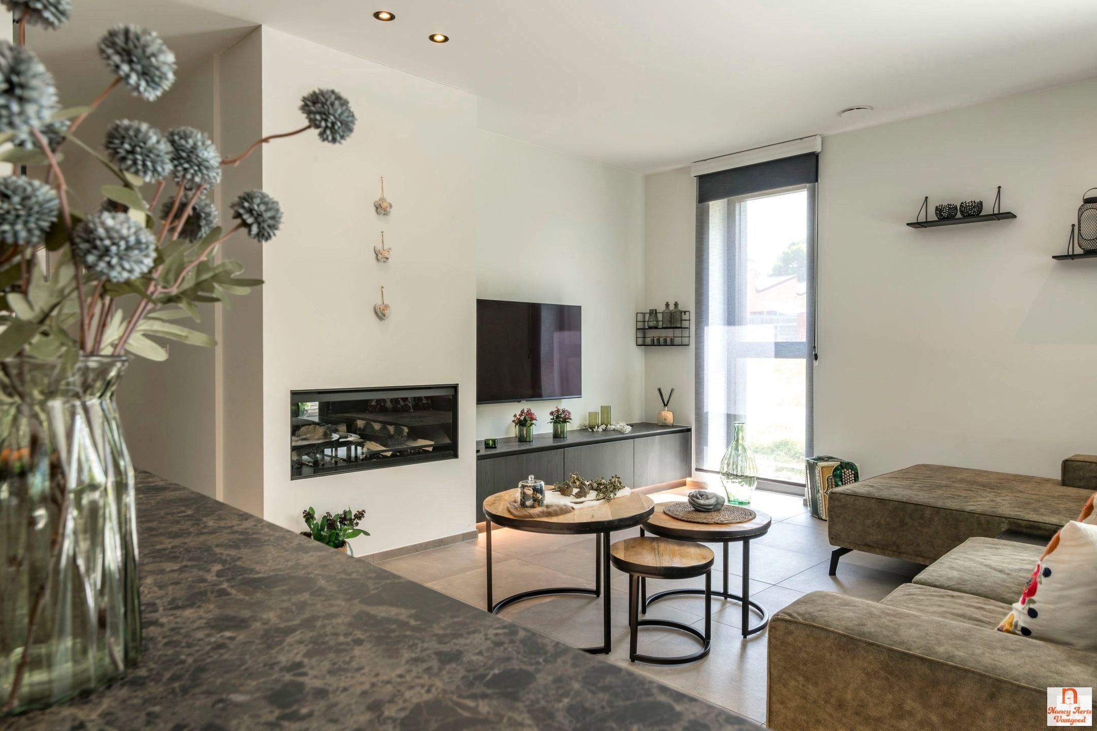 Ruimtelijk wonen met verfijnde afwerking in hartje Koersel foto 9