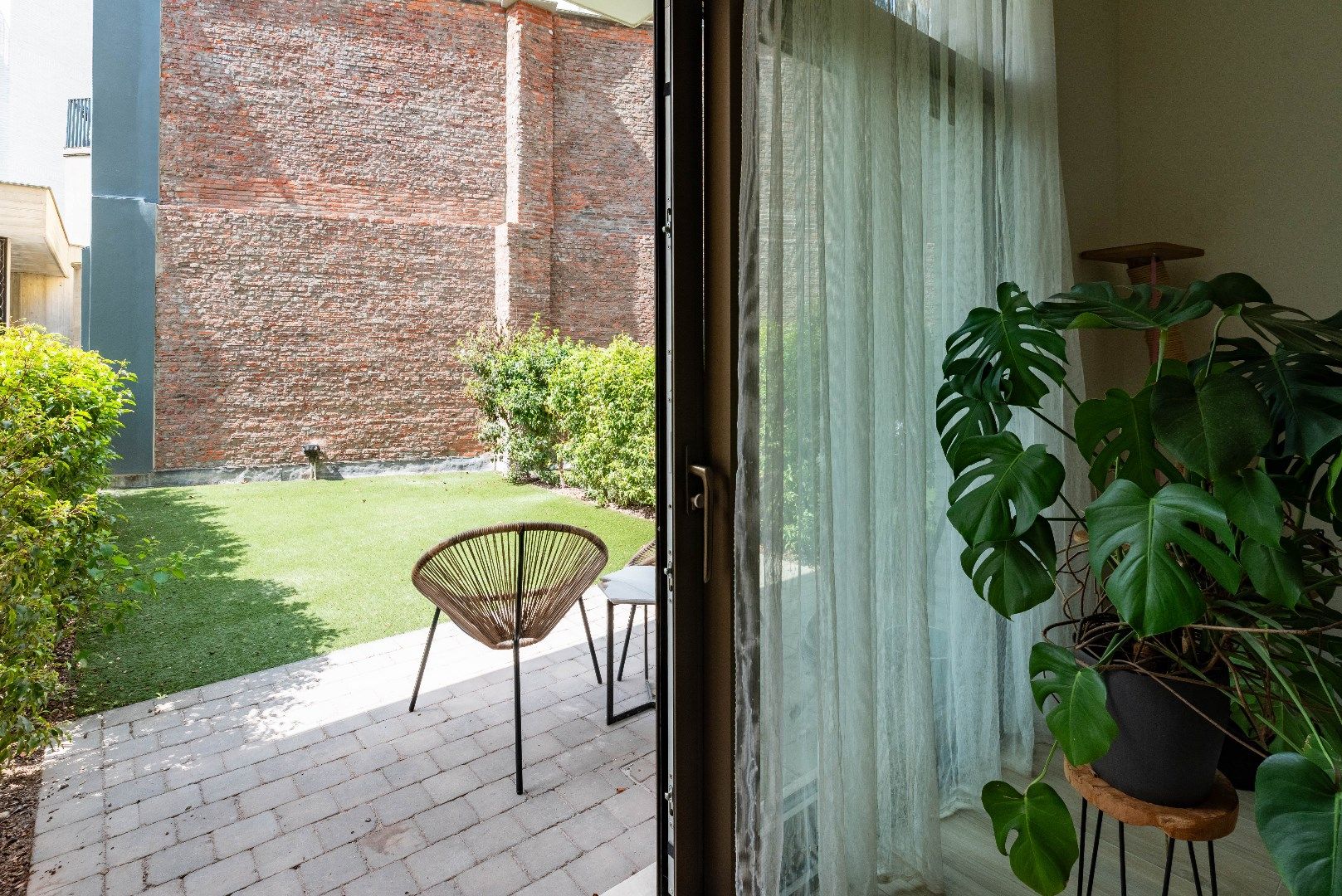 Gelijkvloers appartement met gezellige tuin foto 6