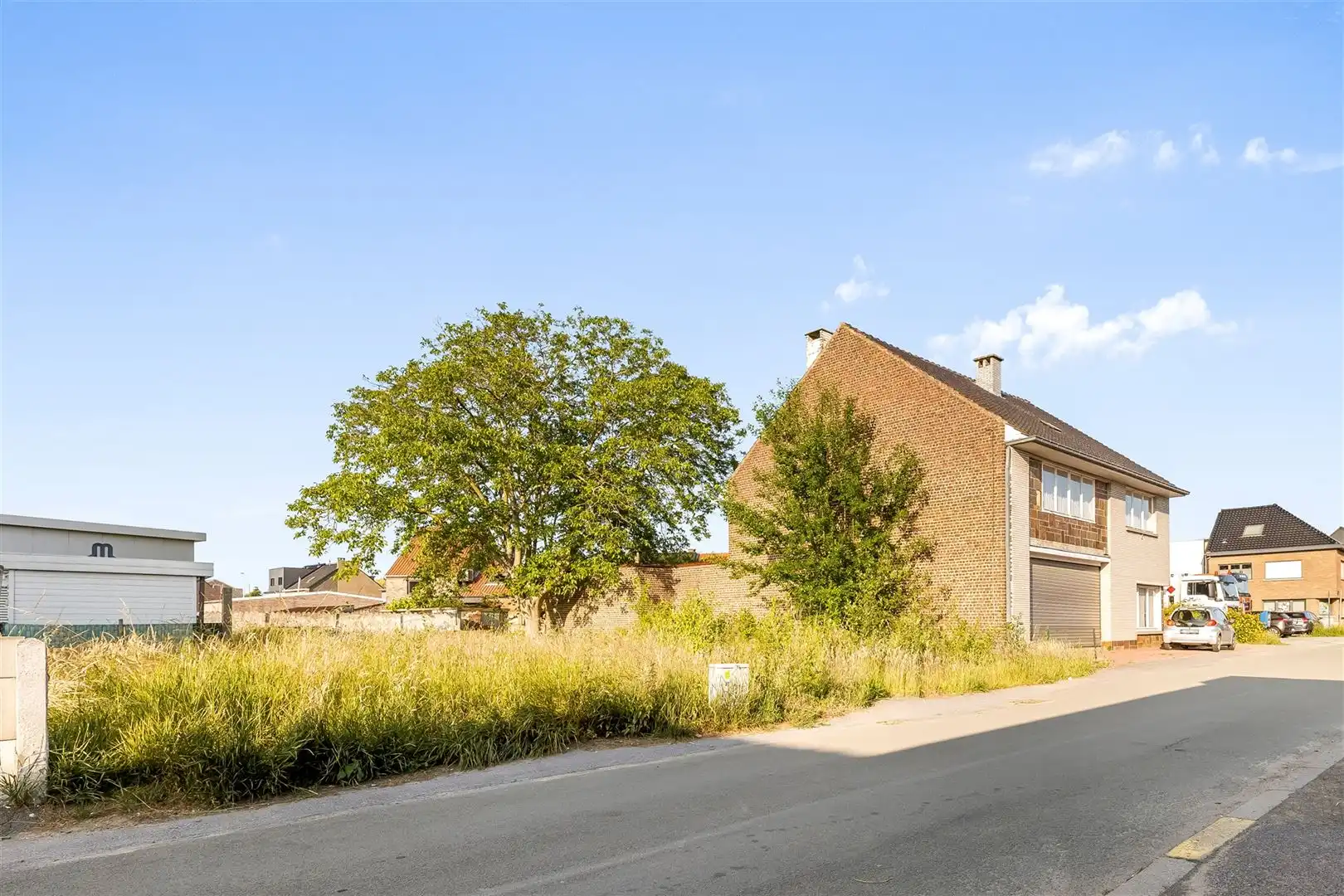 Halfopen bebouwing met aangrenzende bouwgrond - Tal van mogelijkheden foto 3