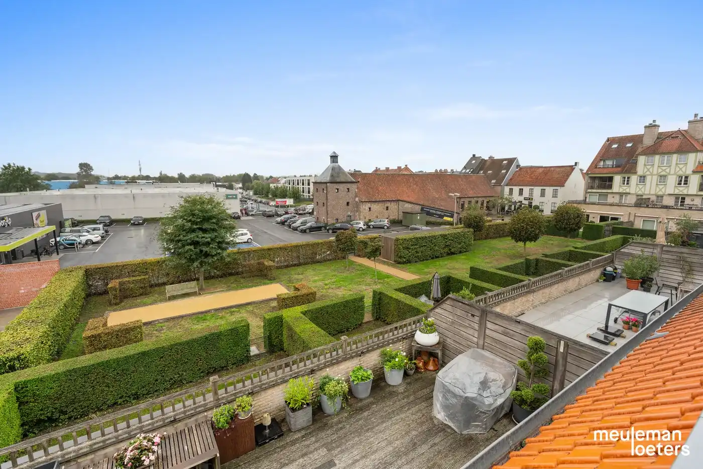 Riant en instapklaar duplexappartement met zéér ruime garagebox in centrum  foto 13