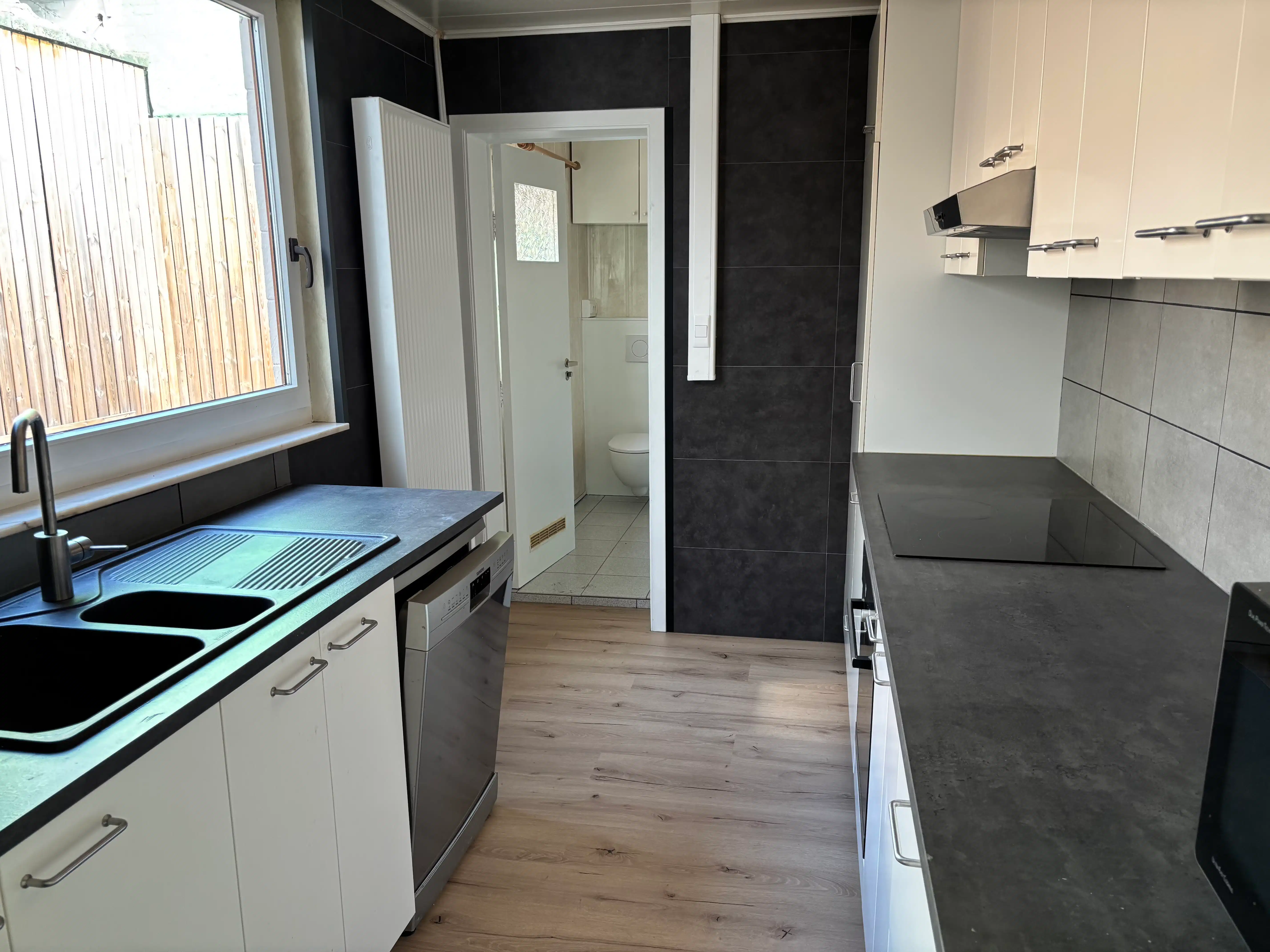 Gezellige rijwoning 4 slaapkamers + garage en stadstuin foto 6