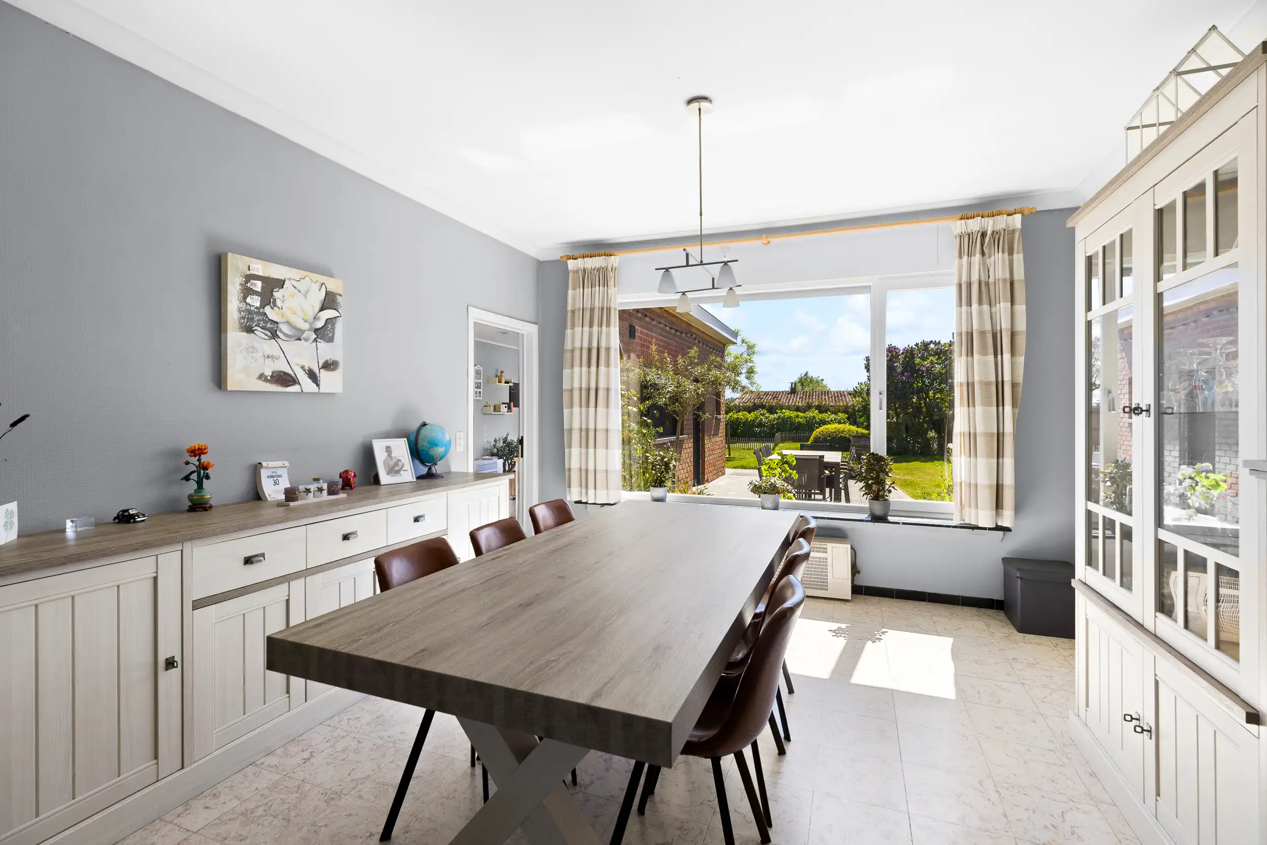 Gelijkvloers wonen met tuin en potentieel foto 2