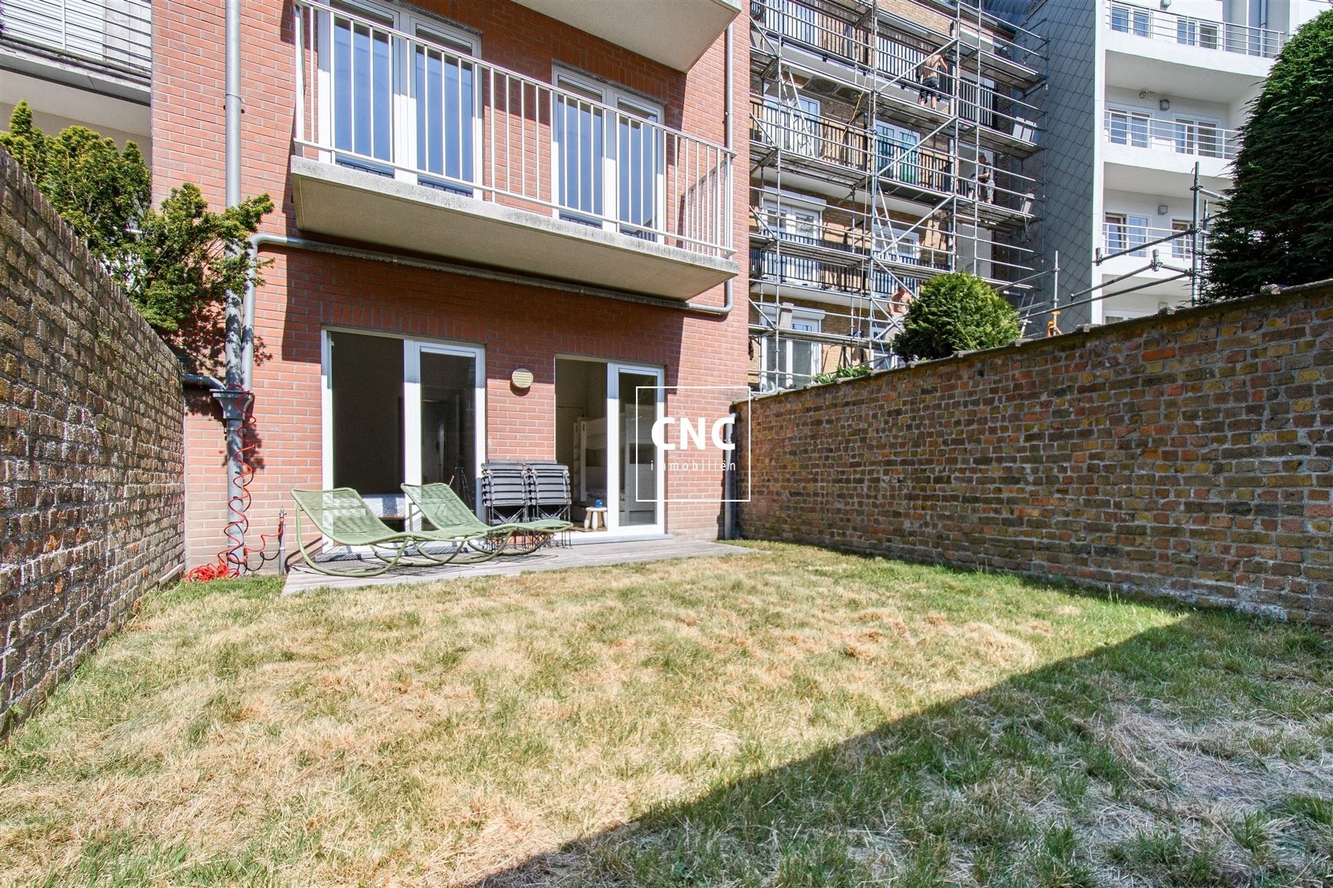 Gelijkvloers appartement met zonnige tuin nabij het centrum
 foto 10