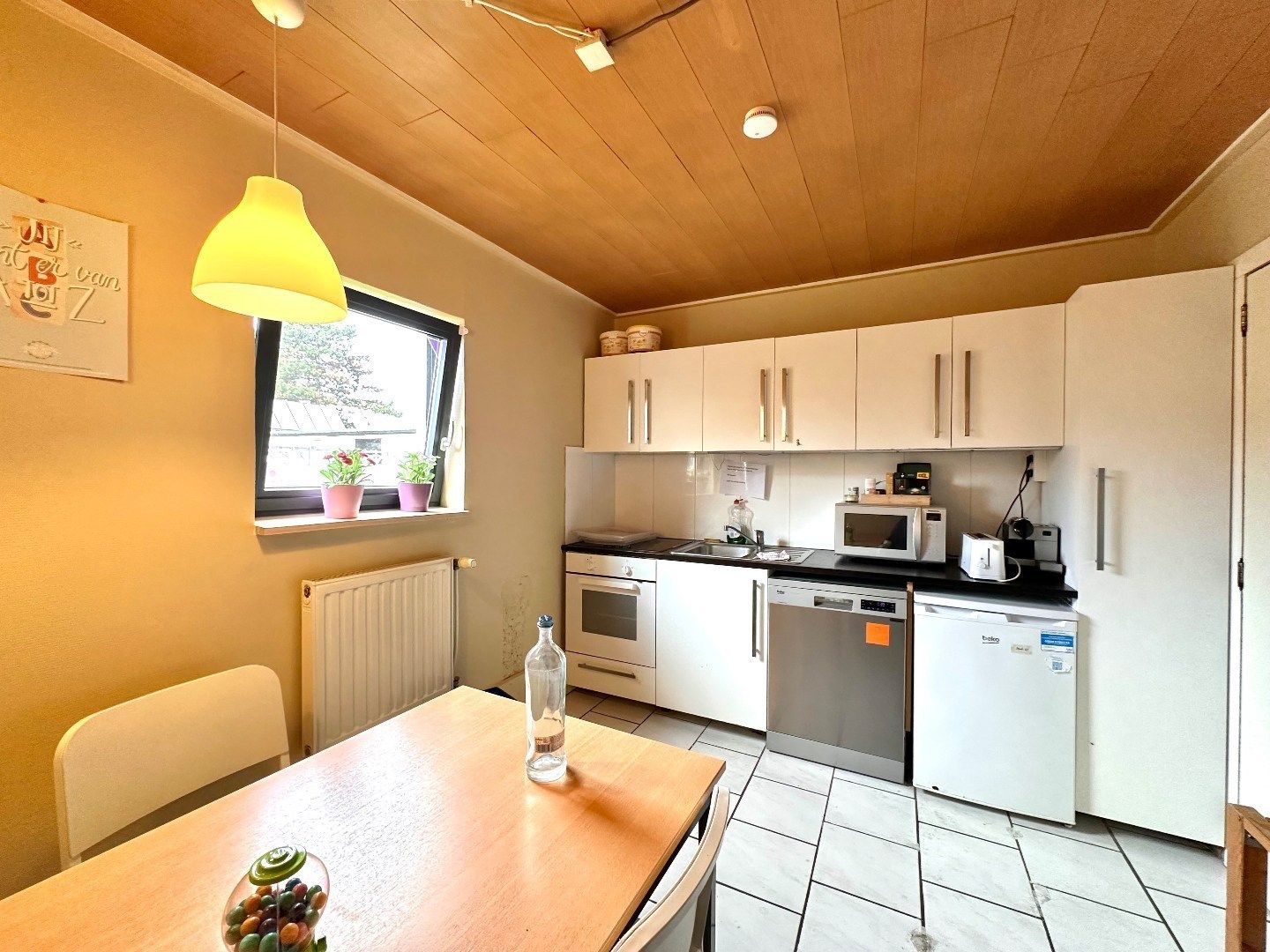 Ruim handelshuis met grote tuin – om te vormen tot een karaktervolle woning foto 9